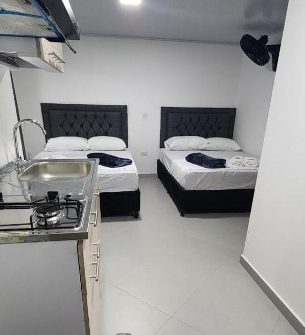 Apartahotel Calasanz Home Medellin Bagian luar foto